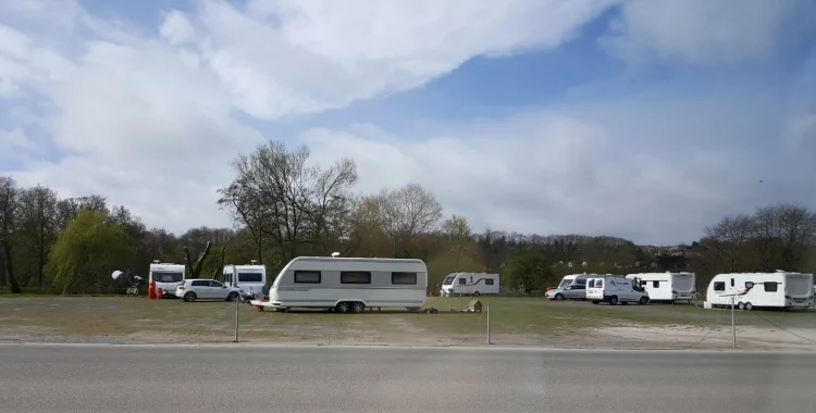 caravans and vehicles parked on land